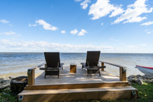Wow Factor @Winnipeg Beach! Amazing LAKEFRONT Resort Property-Luxurious 2021 Custom 3BD 2BATH Furnished BUNGALOW-Captivating Lake VIEWS!