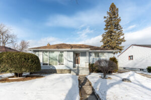 Garden City 3 BDRM 2 BATH Bungalow with Detached Garage on a spacious Lot and Tranquil, Serene Street!